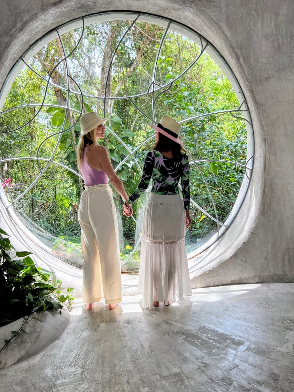 Anna and Alice exploring a tropical wellness retreat